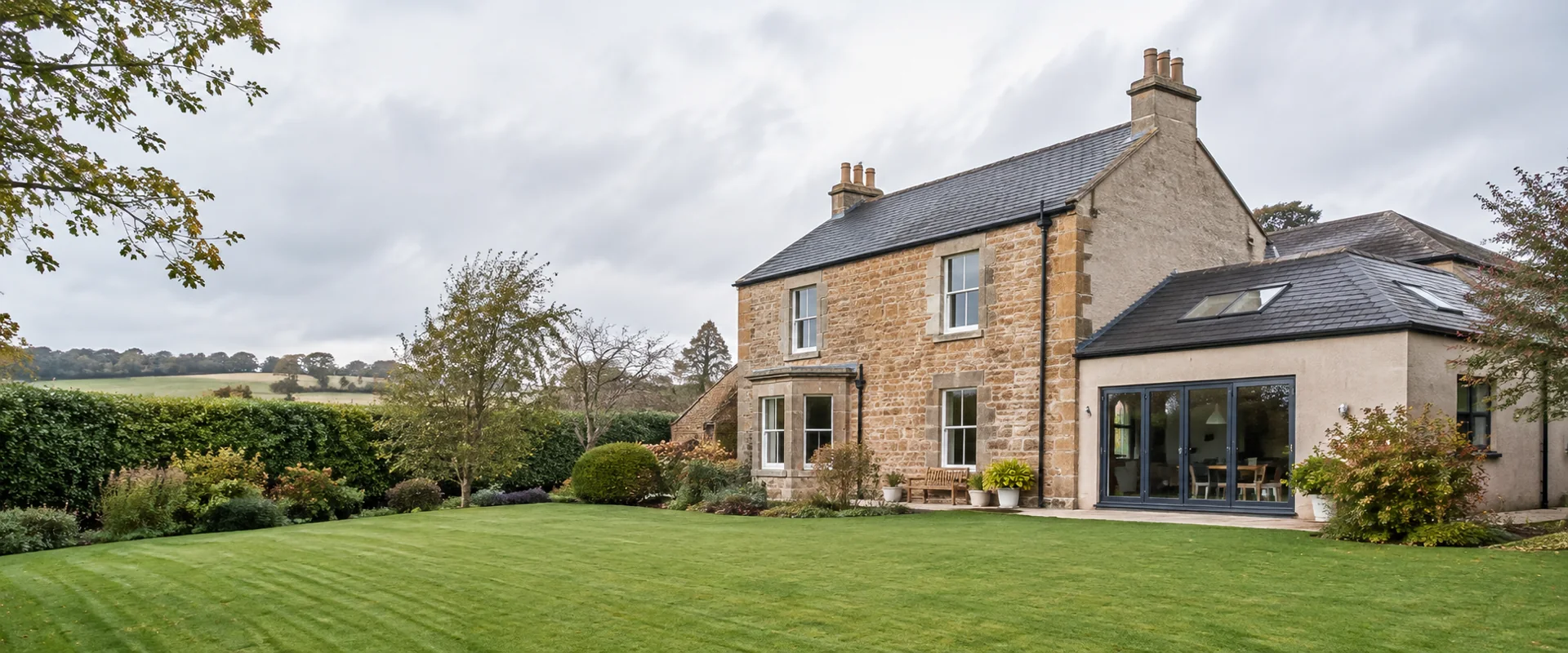 Illustrative Scottish stone house with a contemporary extension