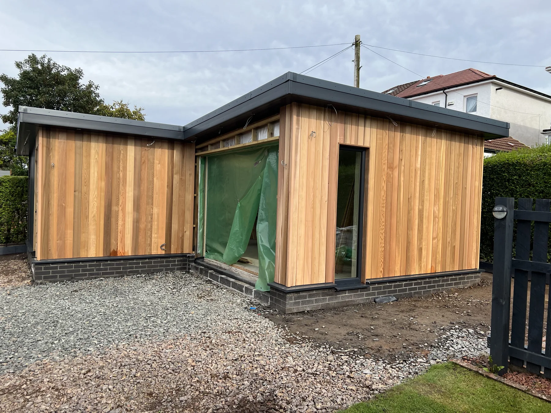 Timber clad garden room with large glazed opening