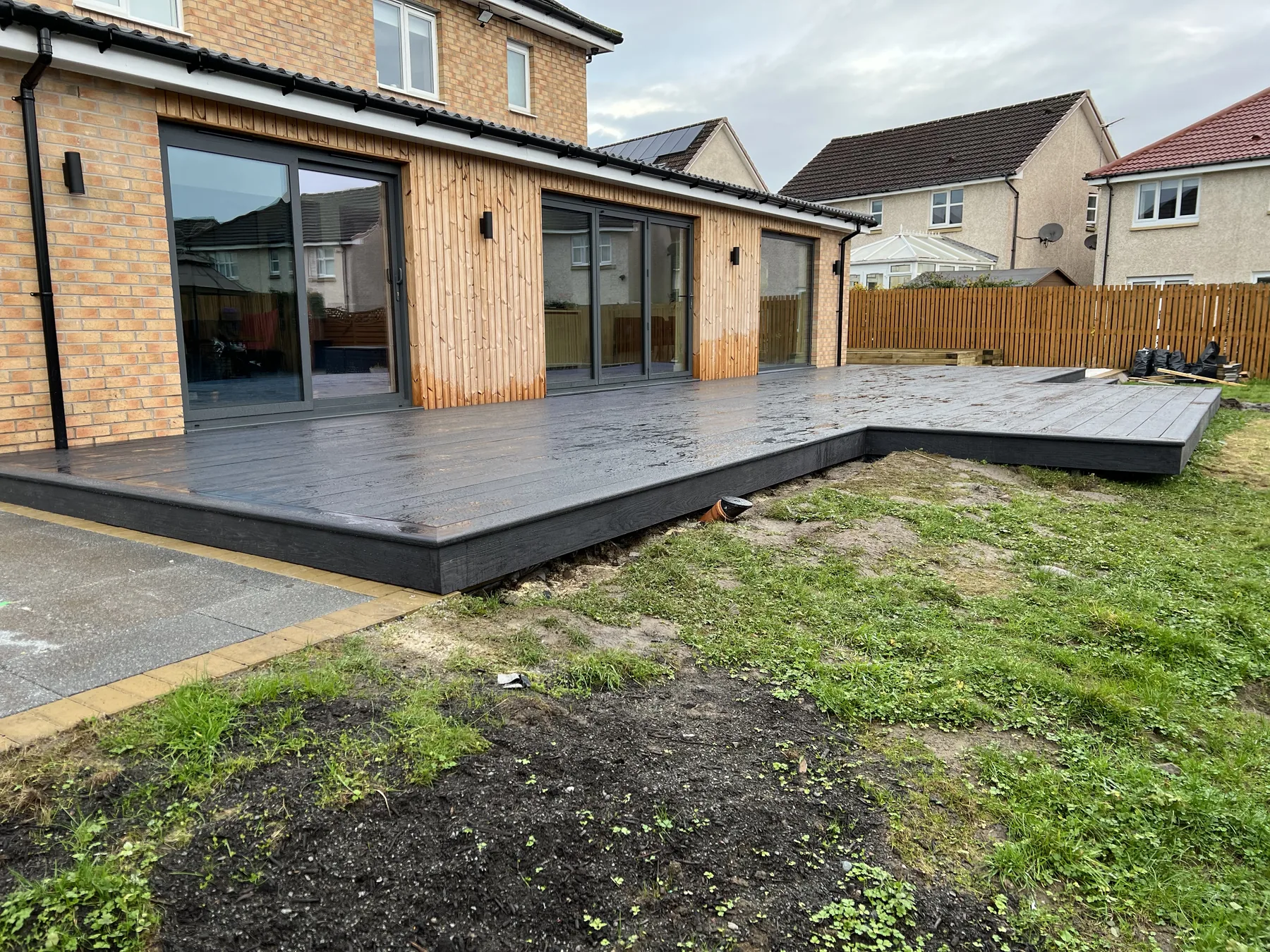 Rear extension with glazed doors and deck